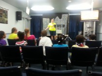 Ms. Kendra (VBS director) welcoming little people